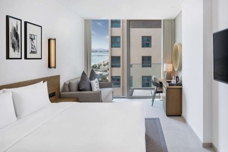 Spojené arabské emiráty Dubaj Radisson Beach Resort Palm Jumeirah 7 dňový pobyt Raňajky Letecky Letisko: Krakov June 2027 (26/06/27- 2/07/27)