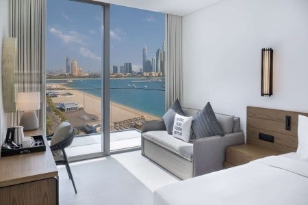 Spojené arabské emiráty Dubaj Radisson Beach Resort Palm Jumeirah 7 dňový pobyt Raňajky Letecky Letisko: Krakov June 2027 (26/06/27- 2/07/27)