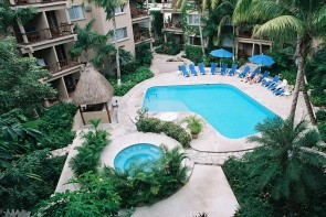Tukan Hotel & Beach Club / Moongate