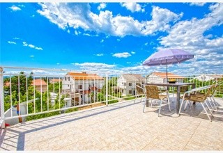 Tajci apartmanház